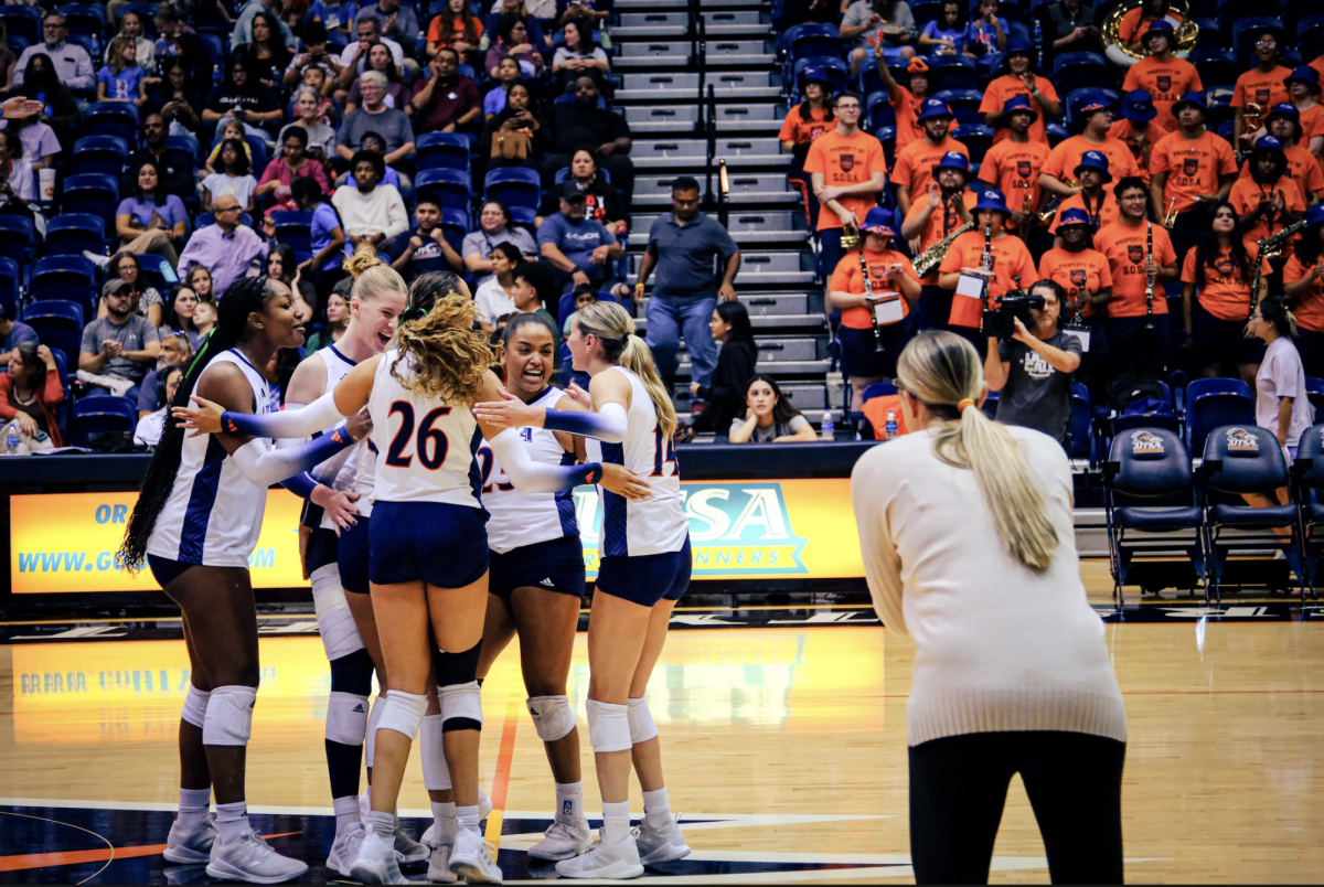 UTSA's volleyball team celebrates winning a point after a long volley.